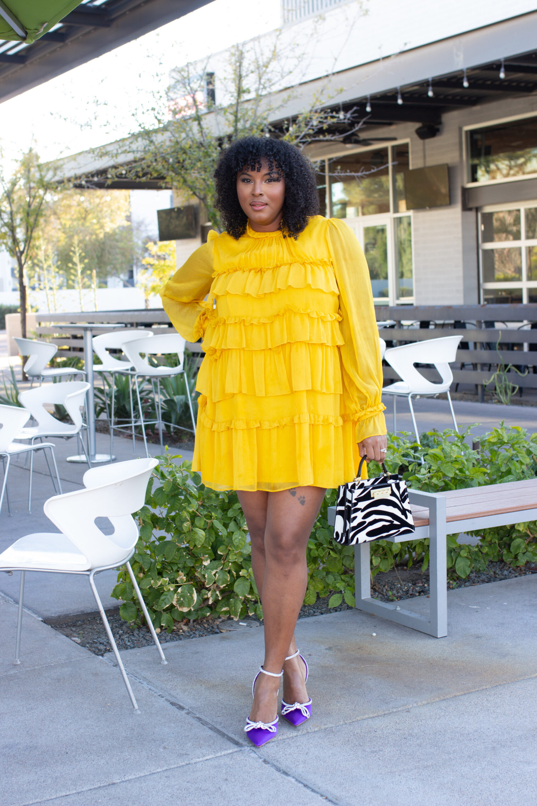 Black and white shop and yellow outfit